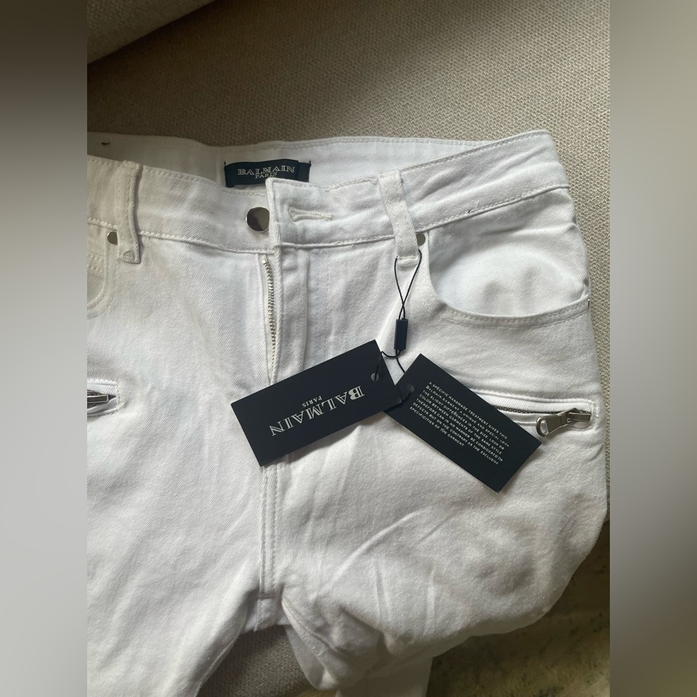 Brand new never worn , Balmain Low Rise slim cut, zipped pockets abs ribbed knee